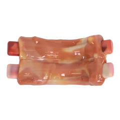 Gros plan sur les Spare Ribs M-Pets Carnivore, jouet texturé au bacon pour chiens